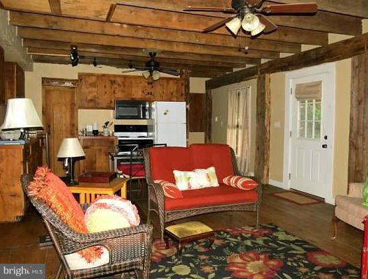 679 Fodderstack Road Flint Hill, VA 22640 - Photo 20 of 24 Guest House Living Room towards Kitchen