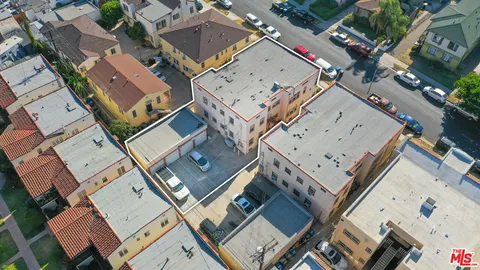 an aerial view of a city with lots of residential buildings