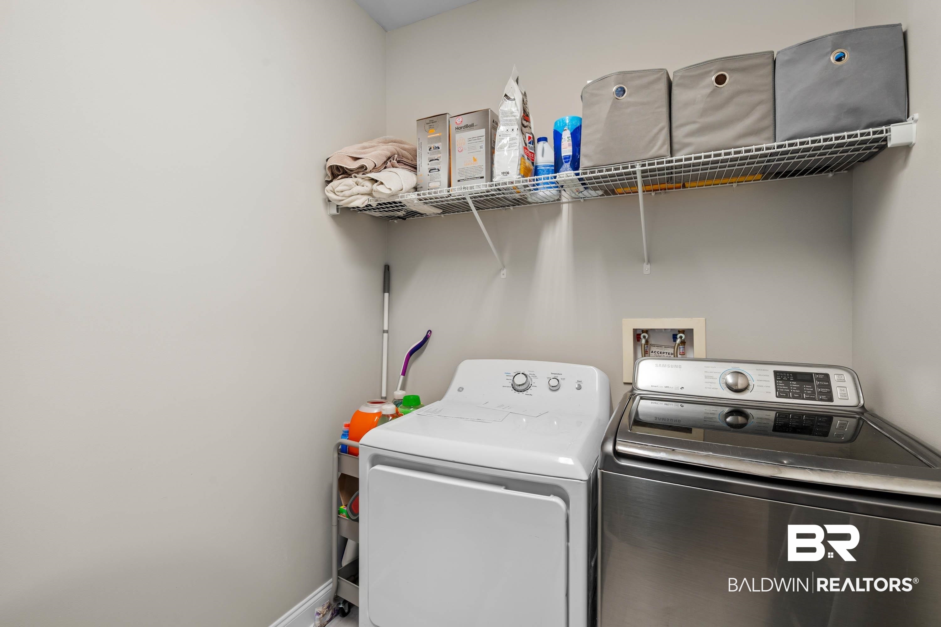 7150 Powell Road, Unit LOT 6A Eight Mile, AL 36613 - Photo 20 of 35 Laundry room with independent washer and dryer and baseboards