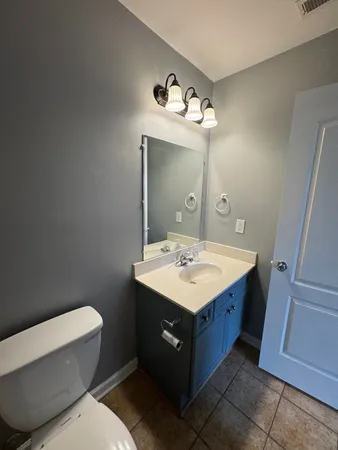 a view of balcony with wooden floor and fence