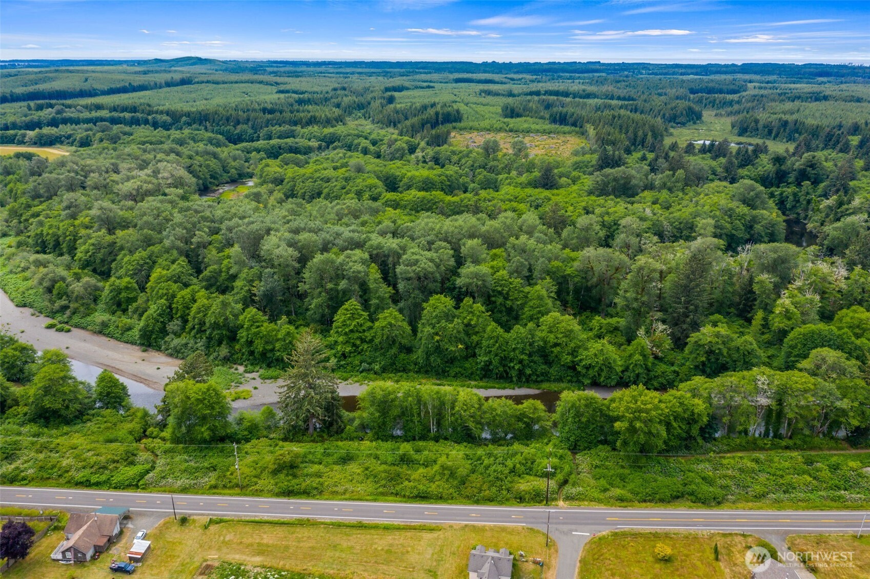 0 Ocean Beach Road Hoquiam, WA 98550 - Photo 8 of 16 a view of a garden with a lake view