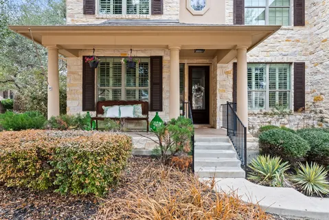 a front view of a house with a porch