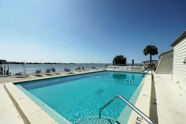 a view of a swimming pool and outdoor space