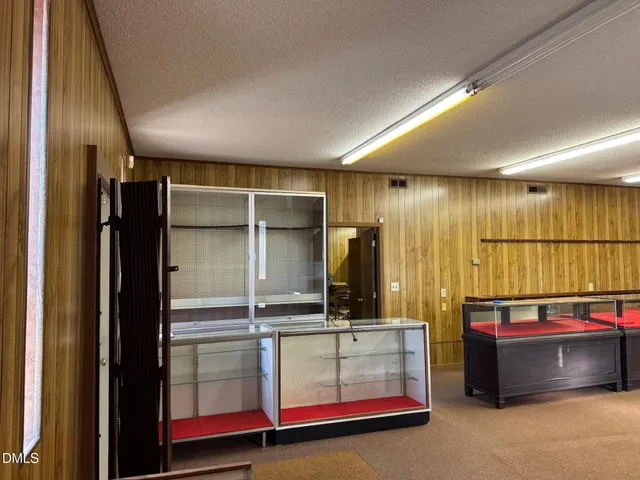 a lobby with furniture and window