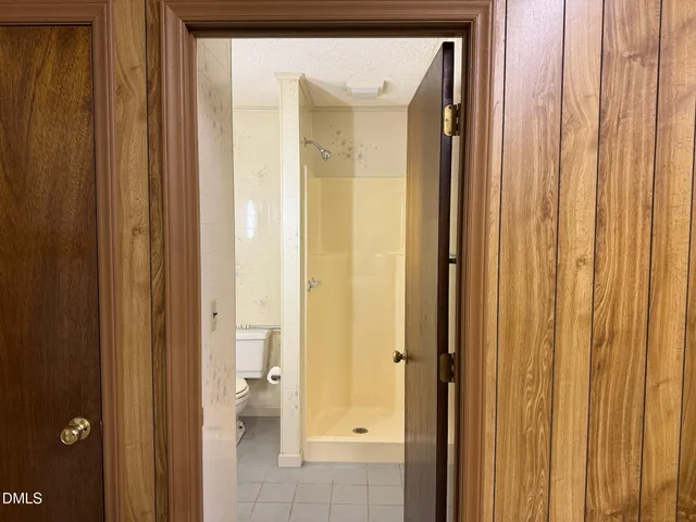 a room with curtain and window