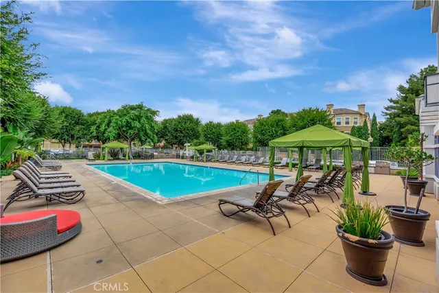 a view of an chairs and table in patio