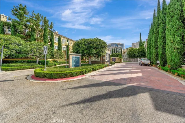 a front view of a building with garden