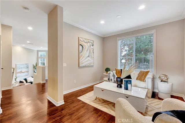 a living room with furniture and a table
