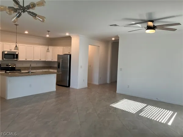 a view of a kitchen with a sink