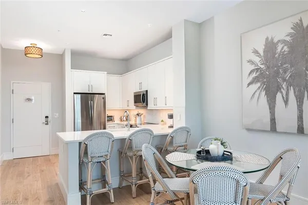 a view of a dining room with furniture