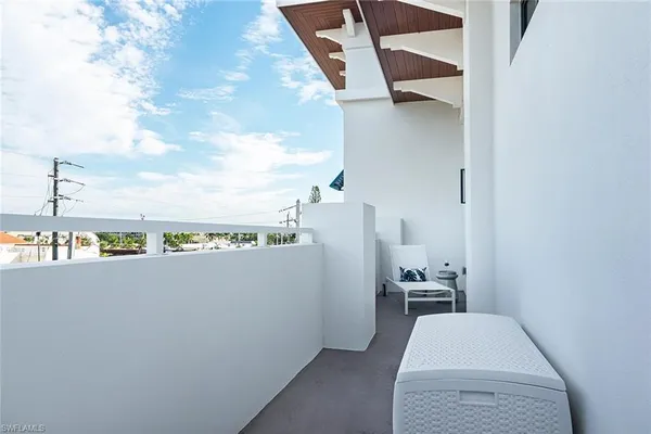 a view of living room with furniture and rug