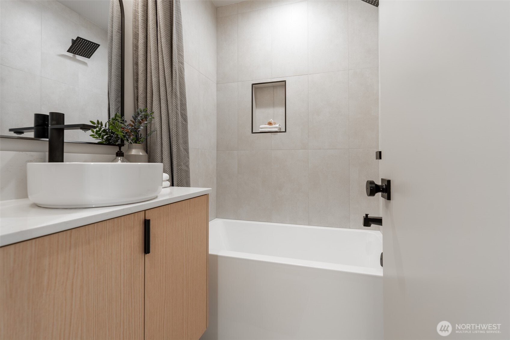 2108 15th Avenue South, Unit B Seattle, WA 98144 - Photo 14 of 40 a bathroom with a bathtub and a sink