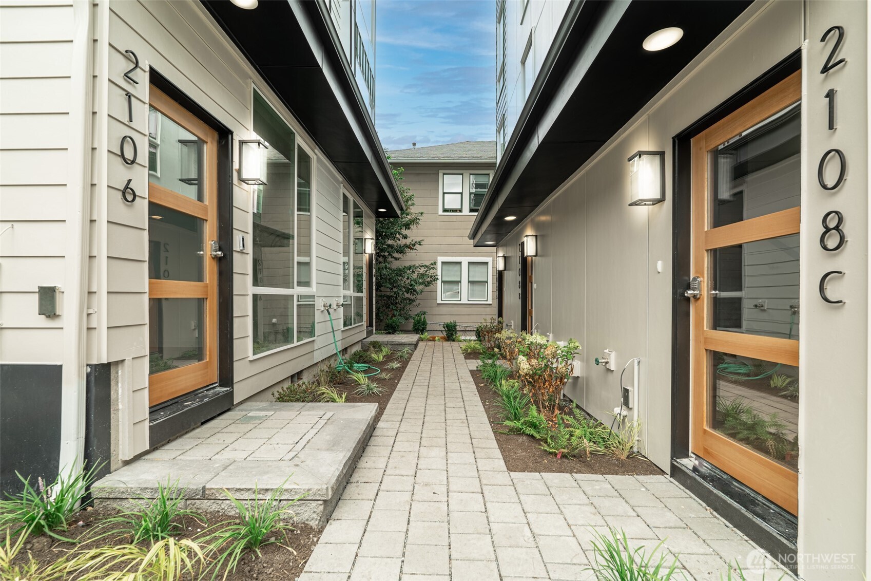 2108 15th Avenue South, Unit B Seattle, WA 98144 - Photo 3 of 40 a view of a house with brick walls