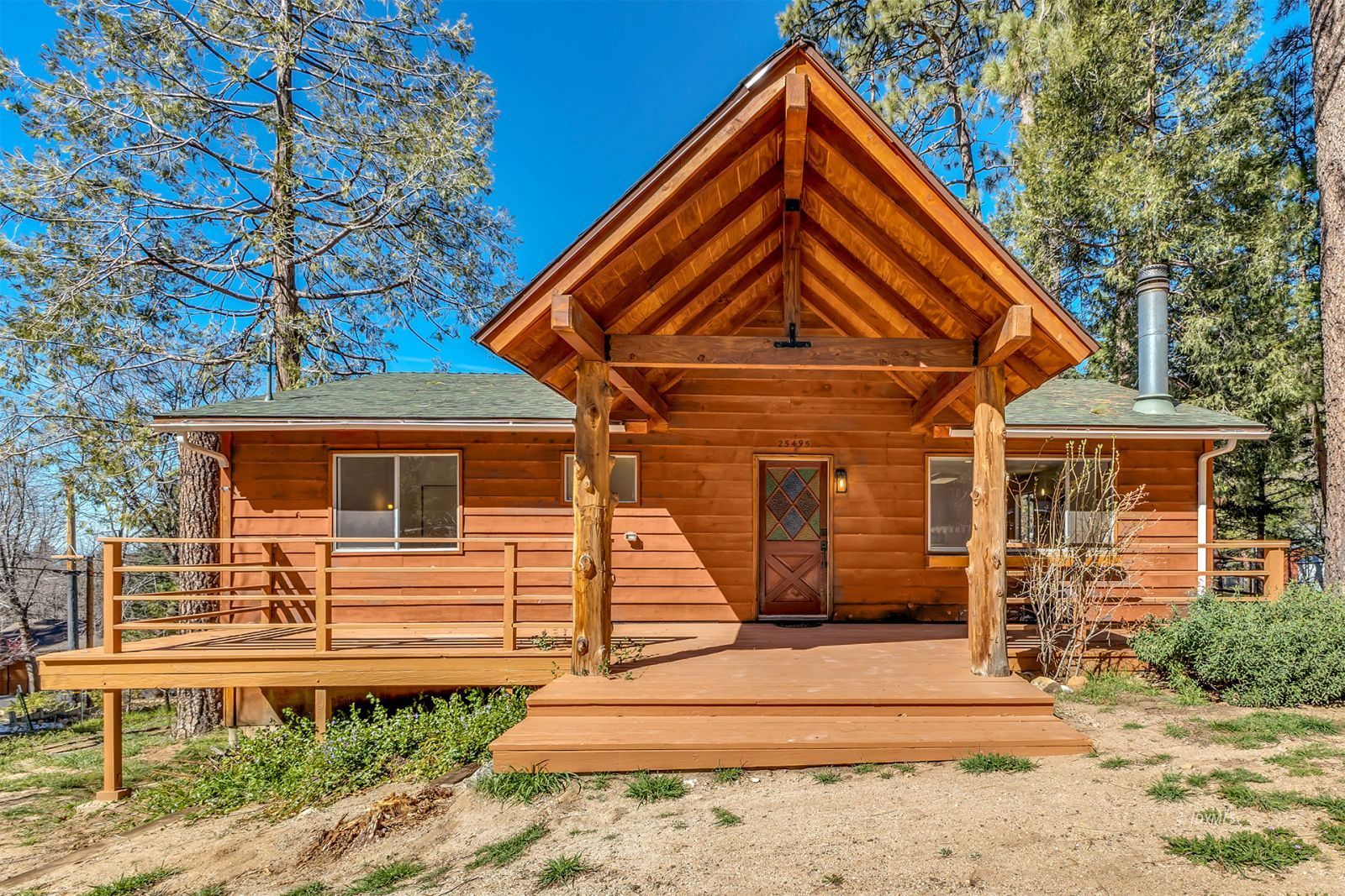 25459 Palomar Road Idyllwild, CA 92549 - Photo 9 of 51 a front view of a house with a yard