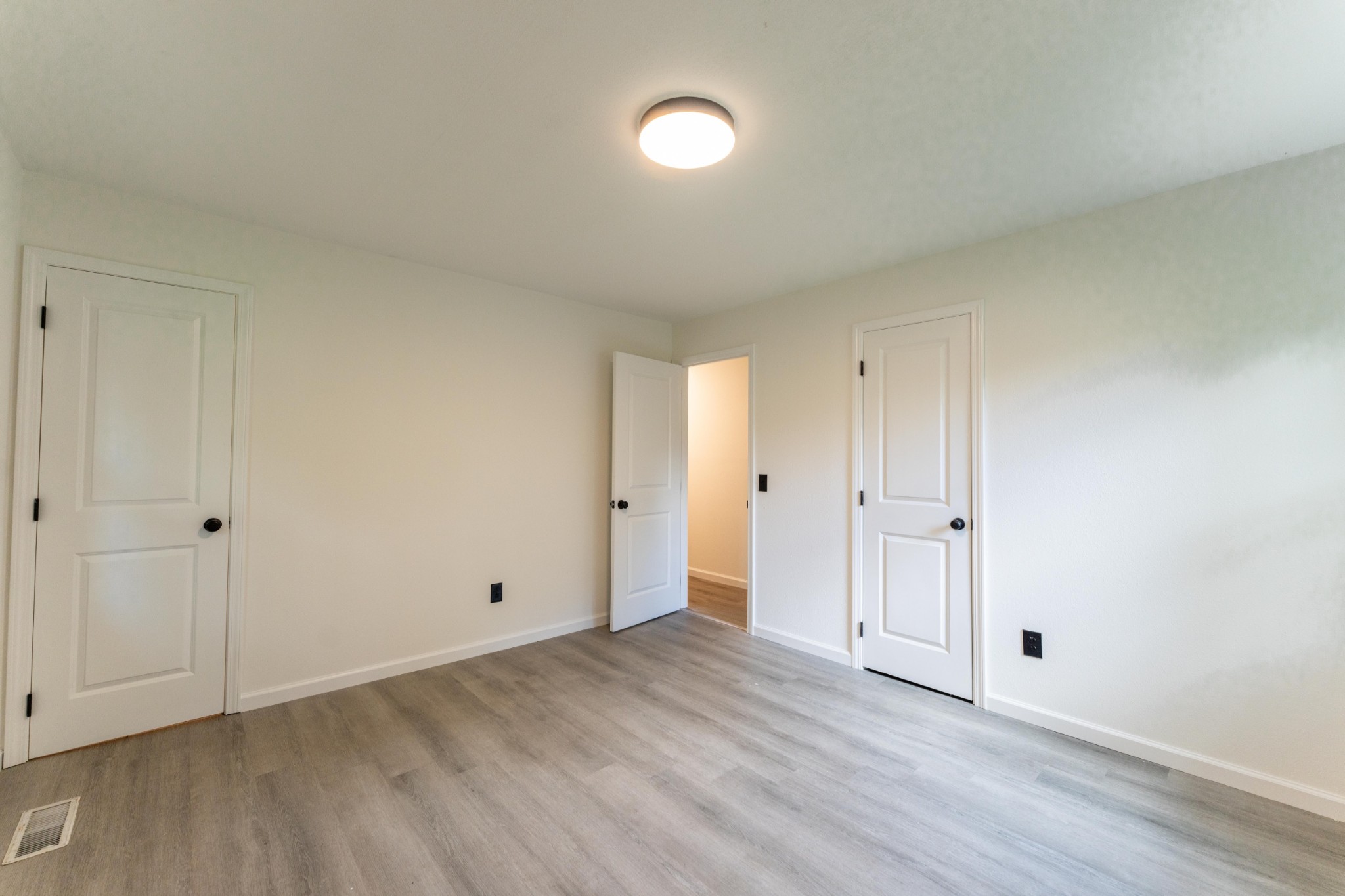 316 Kerrigan Road Crossville, TN 38555 - Photo 11 of 19 a view of an empty room with wooden floor