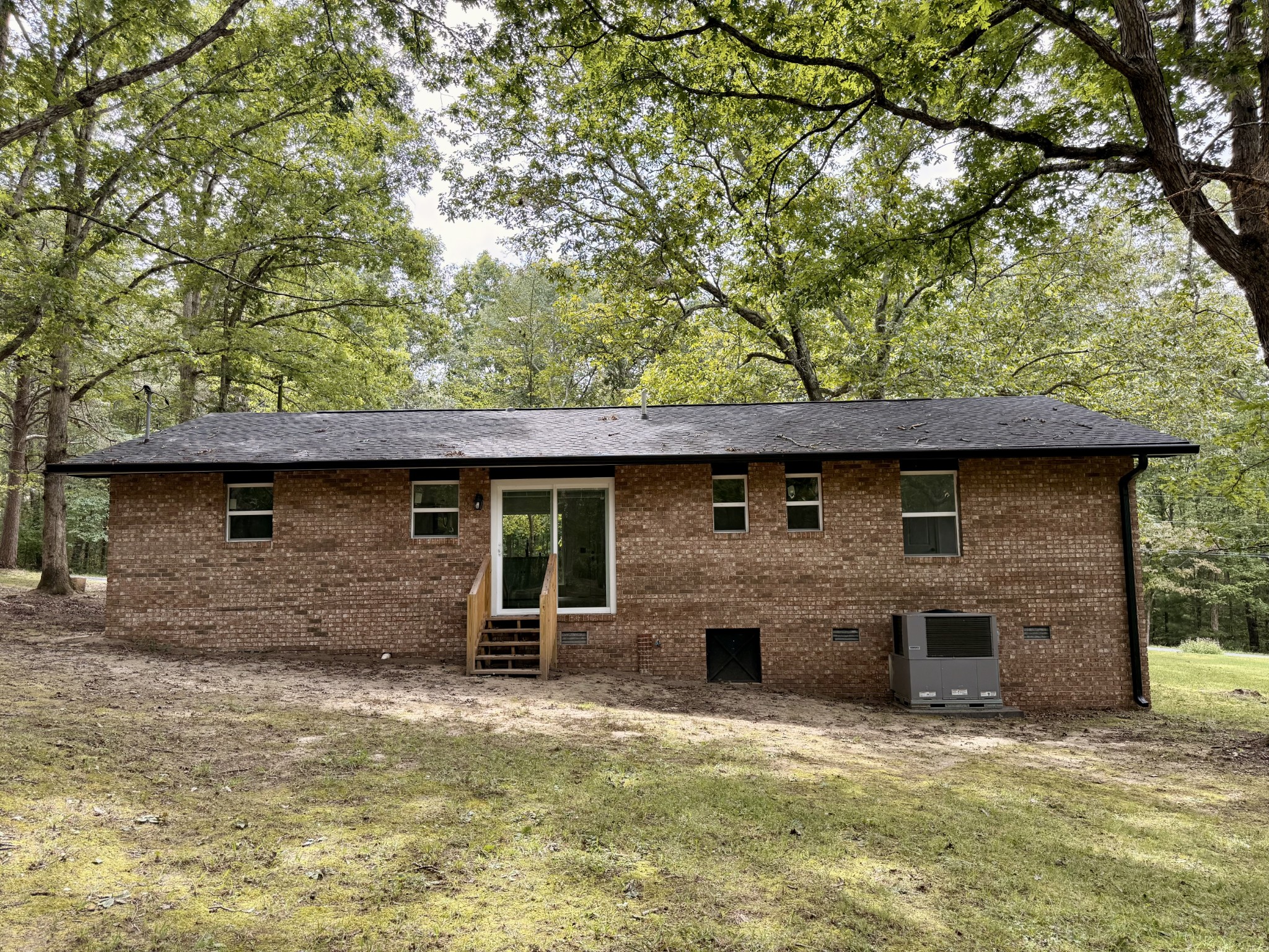 316 Kerrigan Road Crossville, TN 38555 - Photo 18 of 19 a house that has a tree in front of it