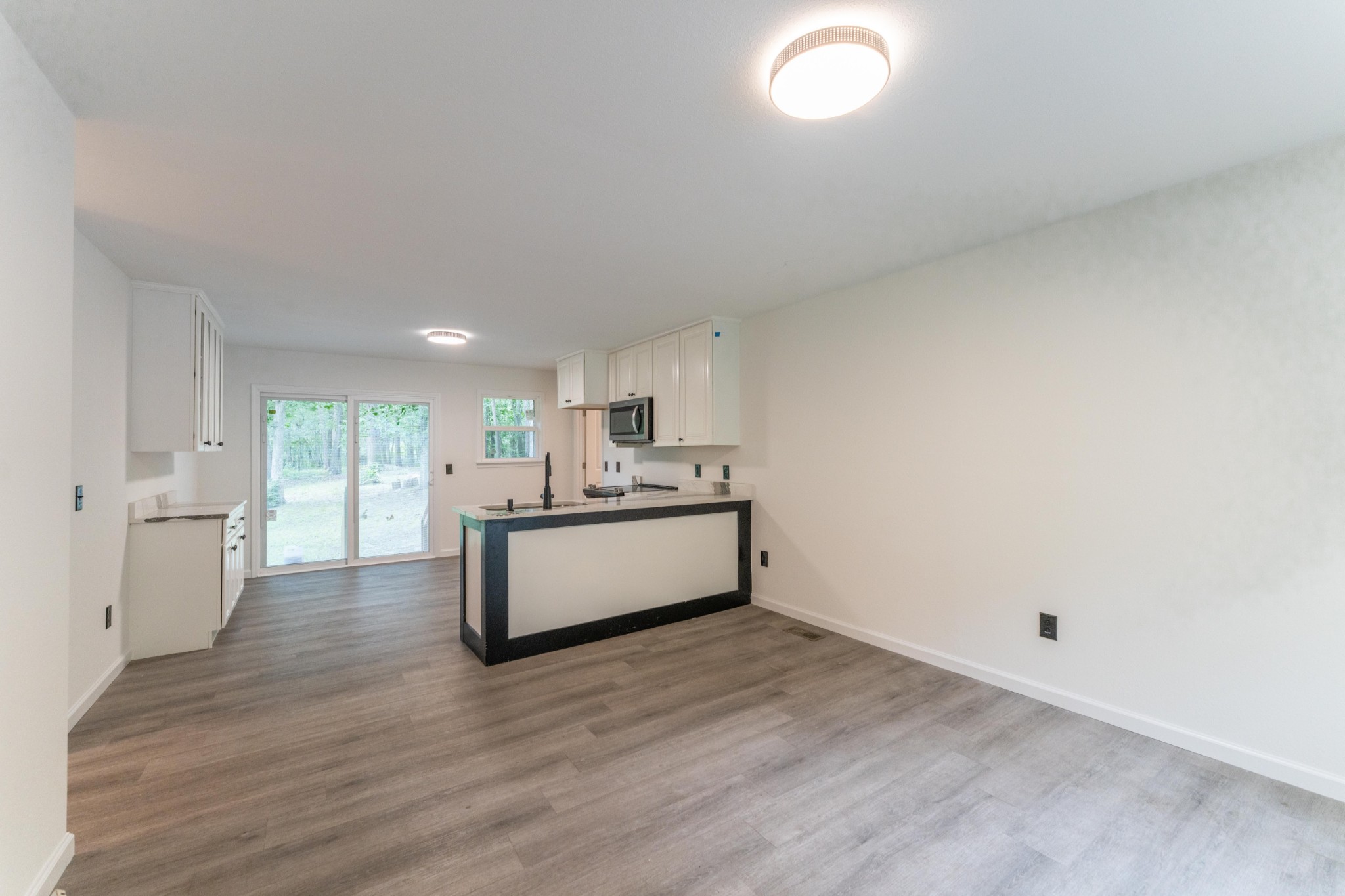 316 Kerrigan Road Crossville, TN 38555 - Photo 4 of 19 a large white kitchen with a large window