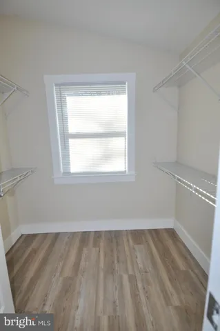 a view of a room that has a window in it