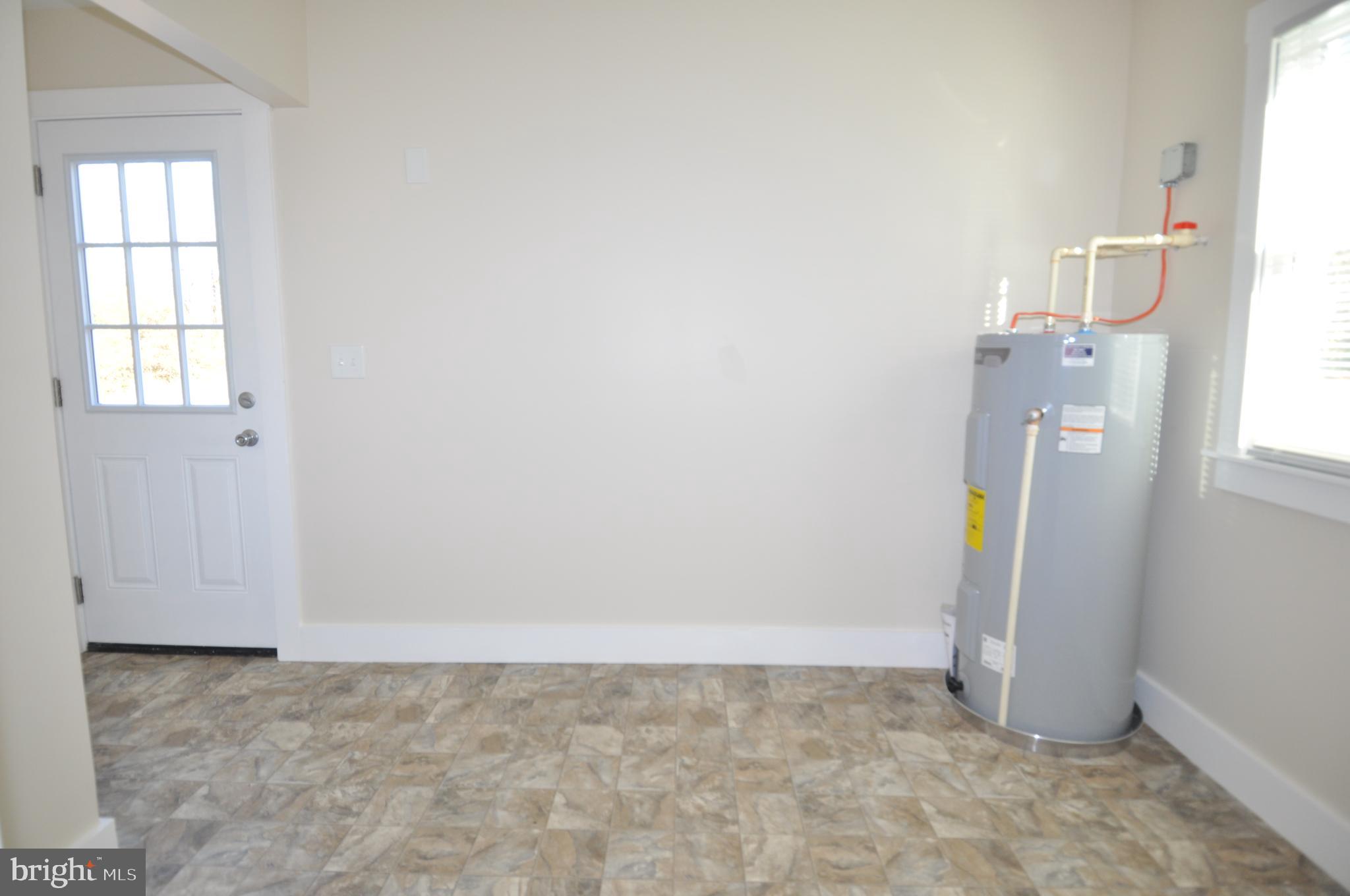 1529 Unionville Road Pocomoke City, MD 21851 - Photo 32 of 33 a view of water heater room