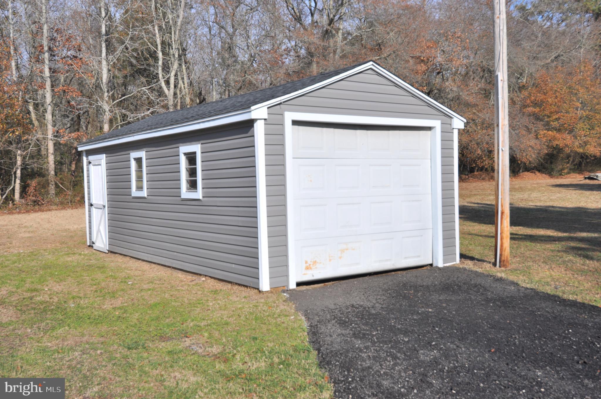 1529 Unionville Road Pocomoke City, MD 21851 - Photo 8 of 33 a house view with a backyard space