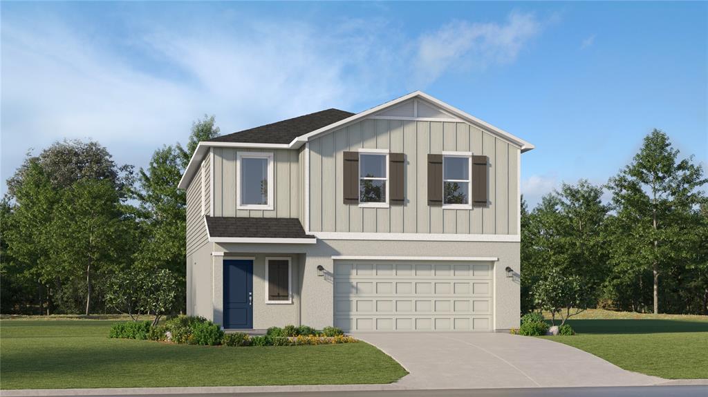 814 Hour Glass Road Lakeland, FL 33801 - Photo 1 of 1 a front view of a house with a yard and garage
