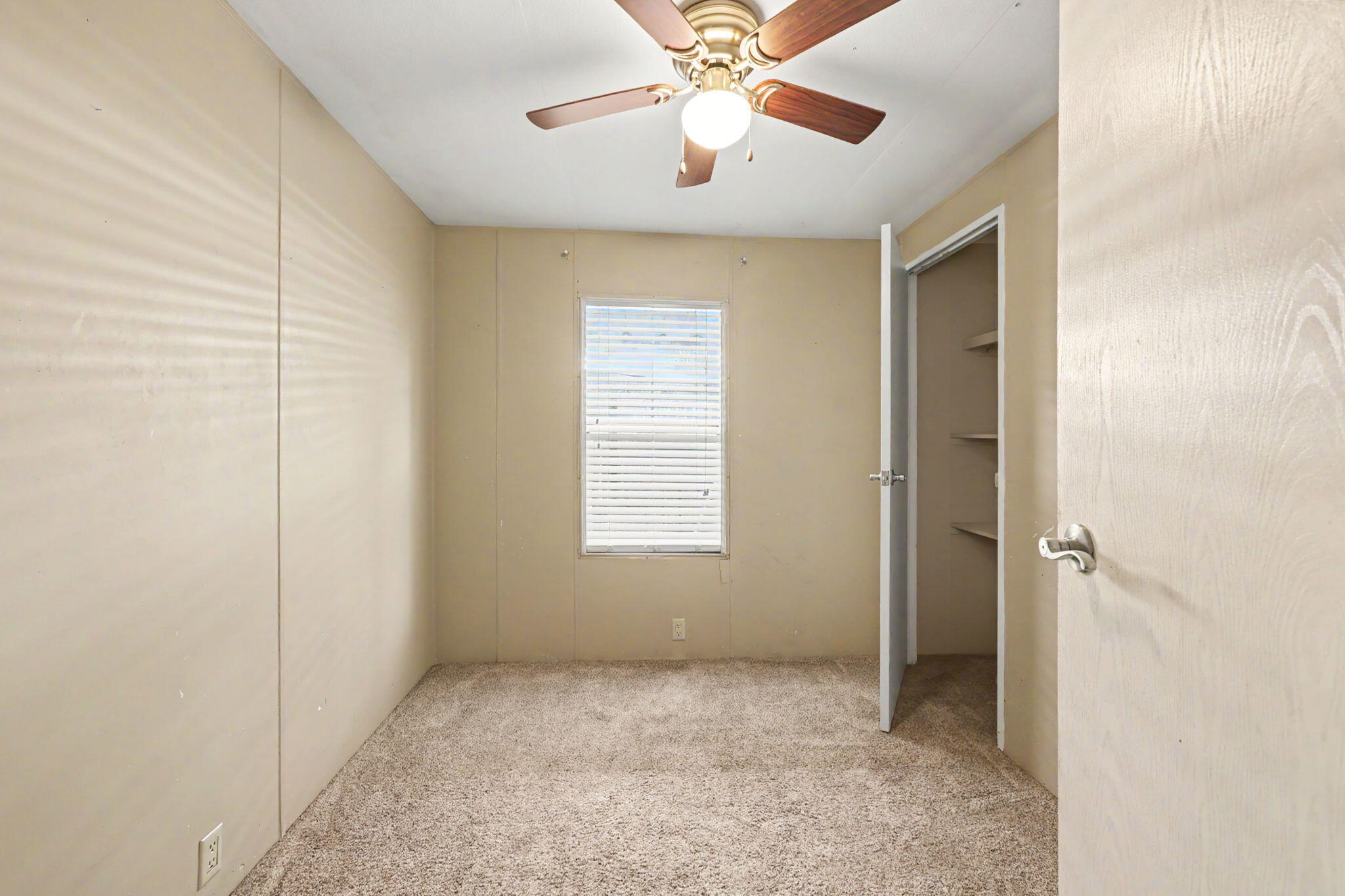 421 Stevens Road, Unit 34 Eagle Point, OR 97524 - Photo 13 of 19 a view of an empty room with a window