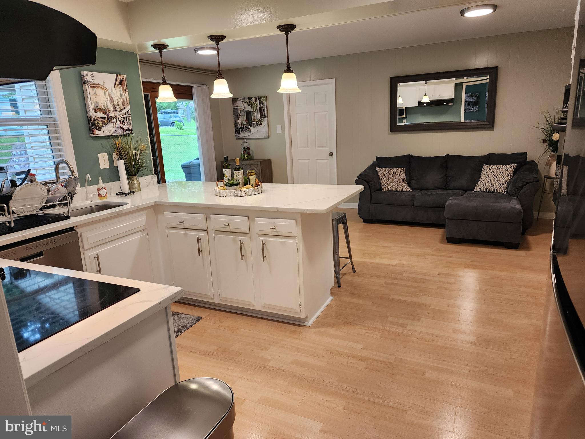 12501 Ivory Pass Laurel, MD 20708 - Photo 19 of 43 View of Kitchen & Den from dining room