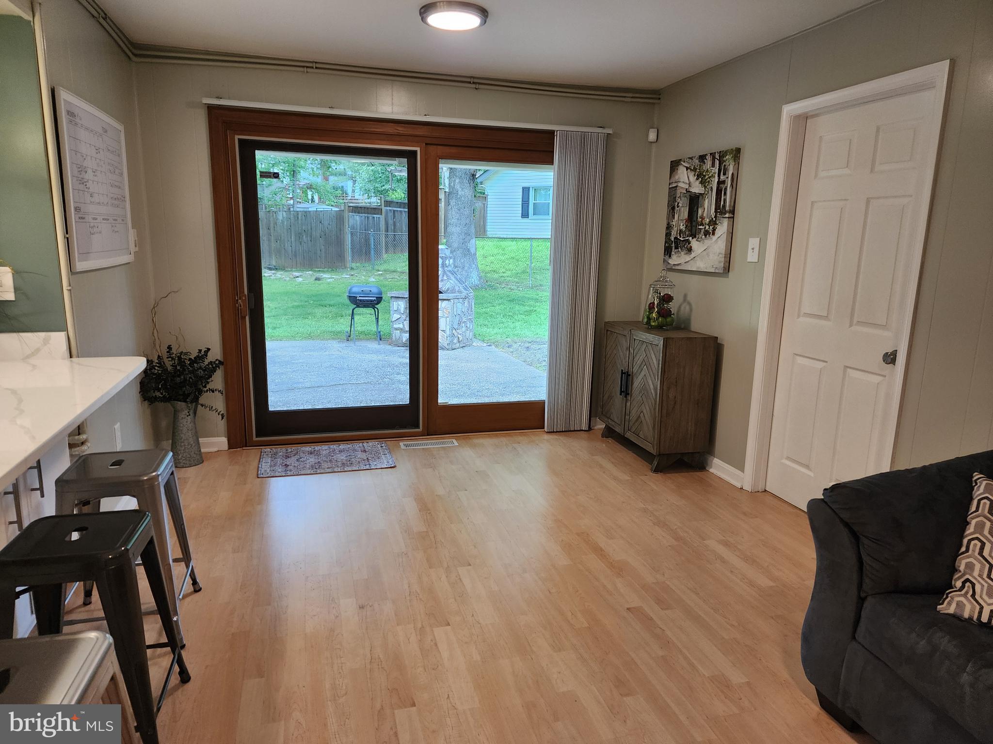 12501 Ivory Pass Laurel, MD 20708 - Photo 10 of 43 Spacious Den leads to & Mud Room on right