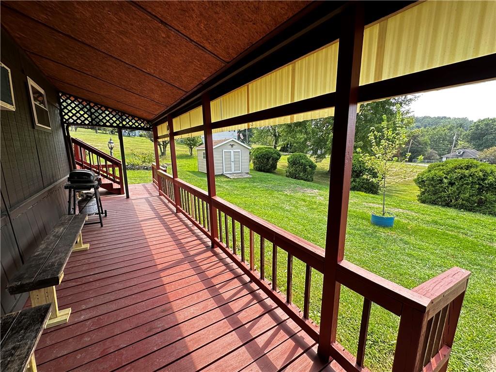 108 Francis Road Perryopolis, PA 15473 - Photo 18 of 20 a view of a porch with wooden floor