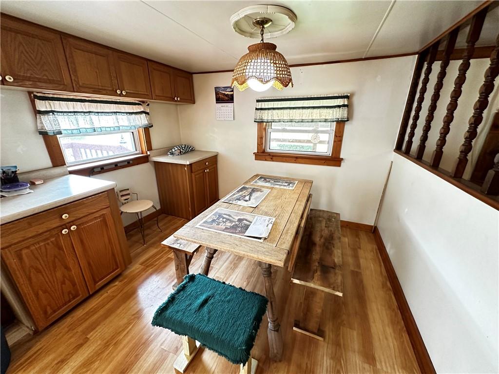 108 Francis Road Perryopolis, PA 15473 - Photo 7 of 20 a kitchen with sink cabinets and wooden floor