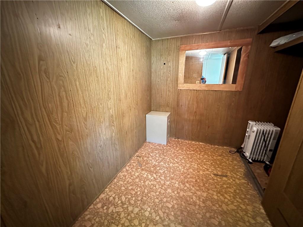 108 Francis Road Perryopolis, PA 15473 - Photo 10 of 20 a bedroom with a bed and chair