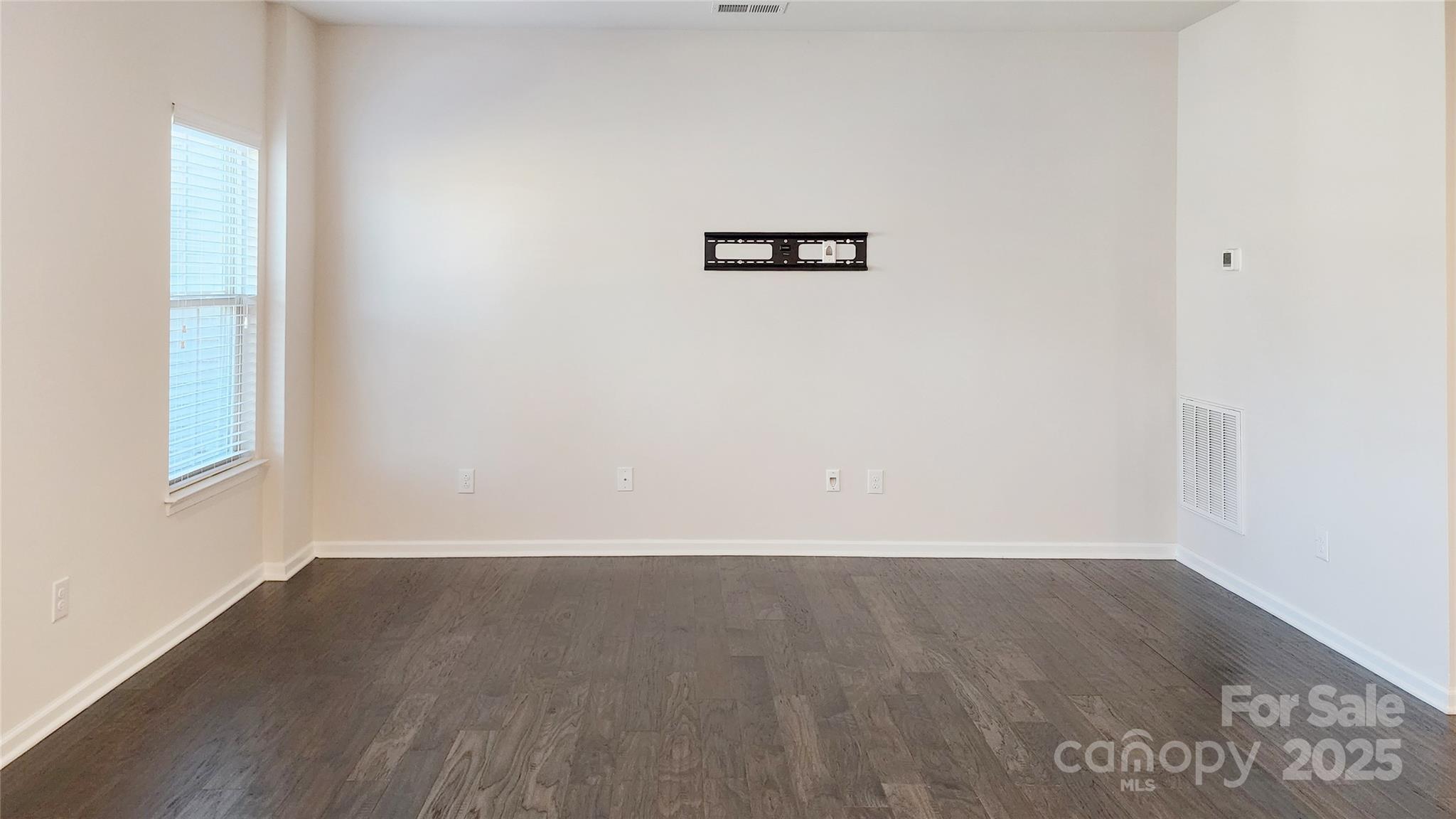 11044 Telegraph Road Northwest Concord, NC 28027 - Photo 12 of 25 a view of a room with wooden floor