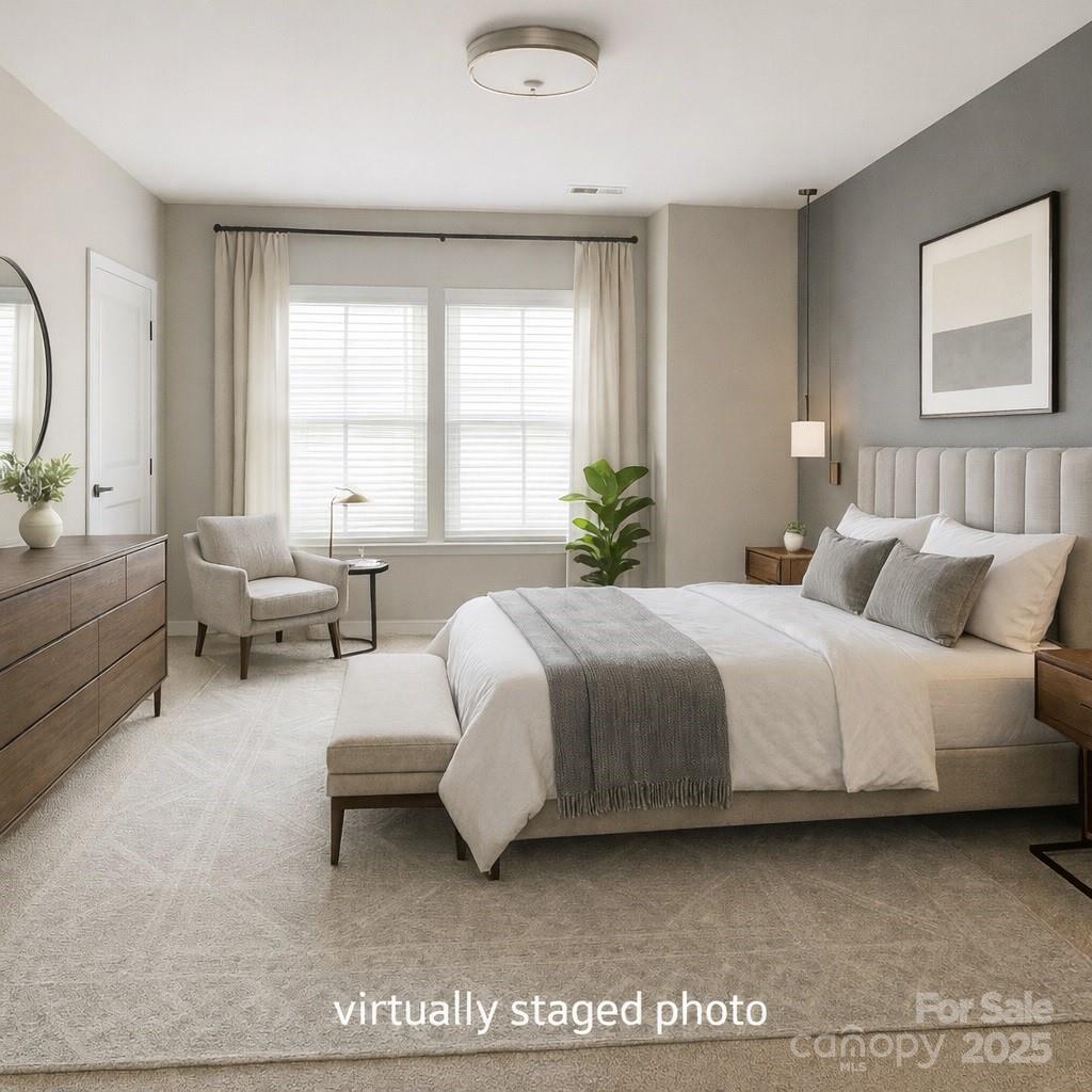 11044 Telegraph Road Northwest Concord, NC 28027 - Photo 14 of 25 a spacious bedroom with a bed and a window