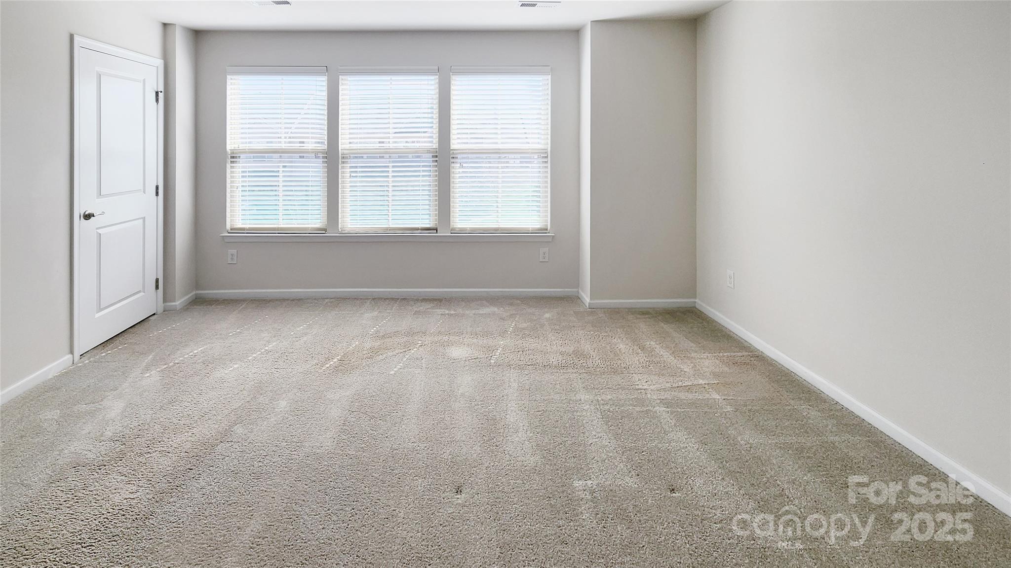 11044 Telegraph Road Northwest Concord, NC 28027 - Photo 15 of 25 an empty room with a window