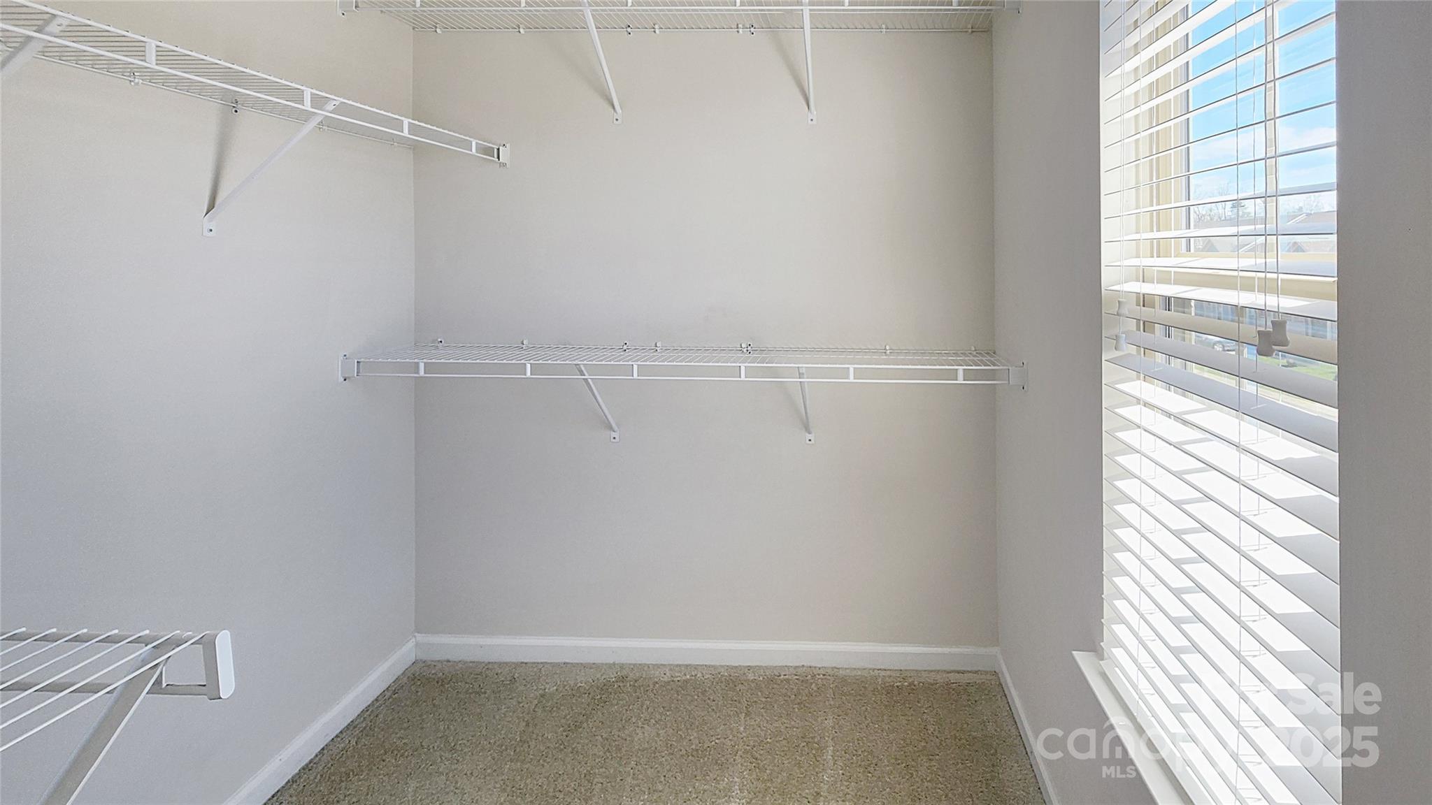 11044 Telegraph Road Northwest Concord, NC 28027 - Photo 18 of 25 a view of an empty walk in closet