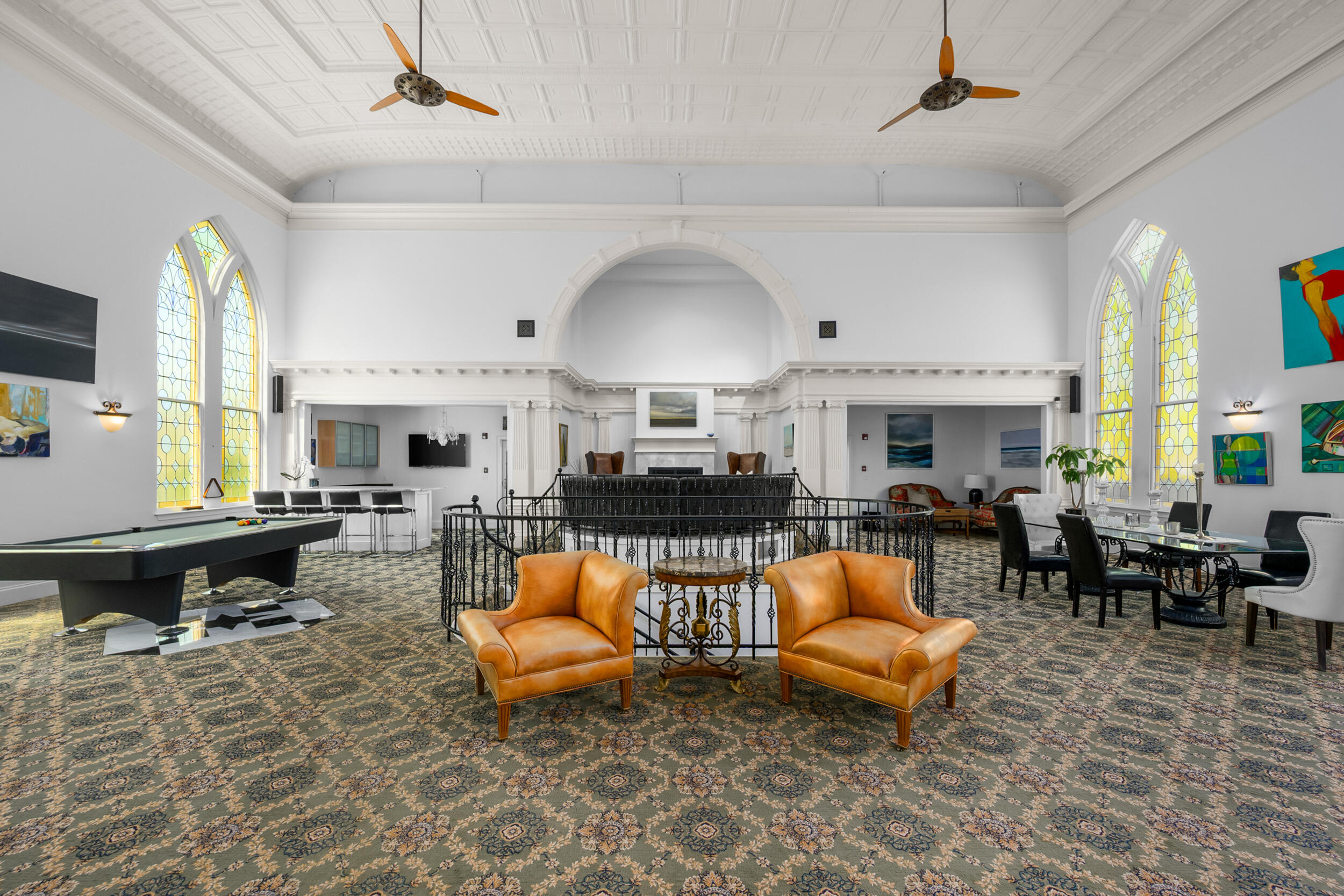 143 Main Street Sandwich, MA 02563 - Photo 11 of 39 a living room with furniture a fireplace and a table