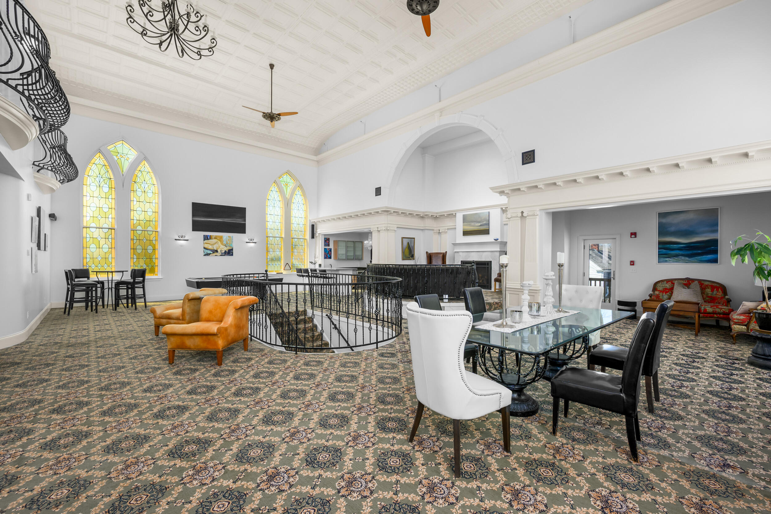 143 Main Street Sandwich, MA 02563 - Photo 14 of 39 a outdoor space with lots of white furniture a rug and a chandelier