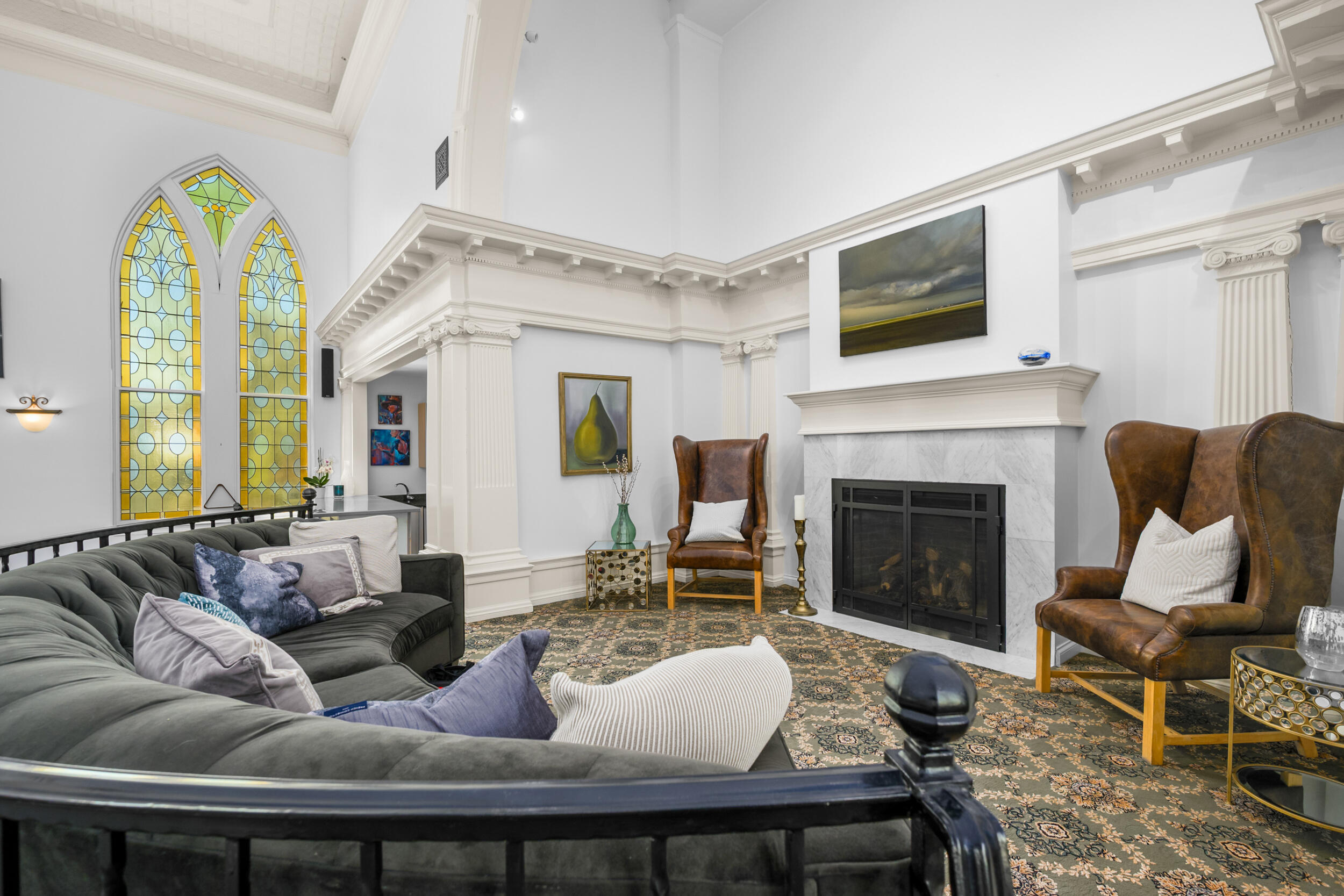 143 Main Street Sandwich, MA 02563 - Photo 15 of 39 a living room with furniture fireplace and a flat screen tv