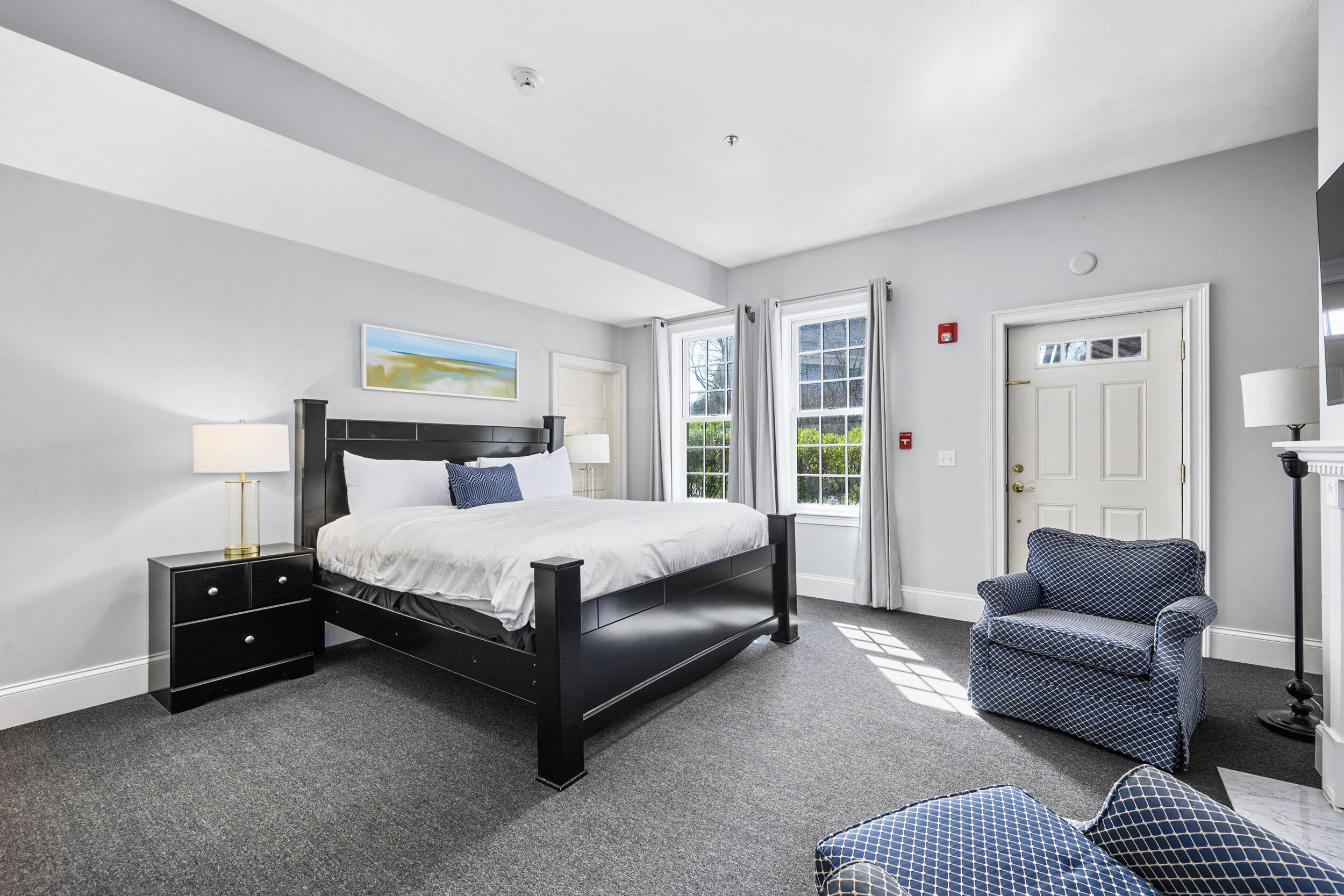 143 Main Street Sandwich, MA 02563 - Photo 28 of 39 a bedroom with a bed couch and a window