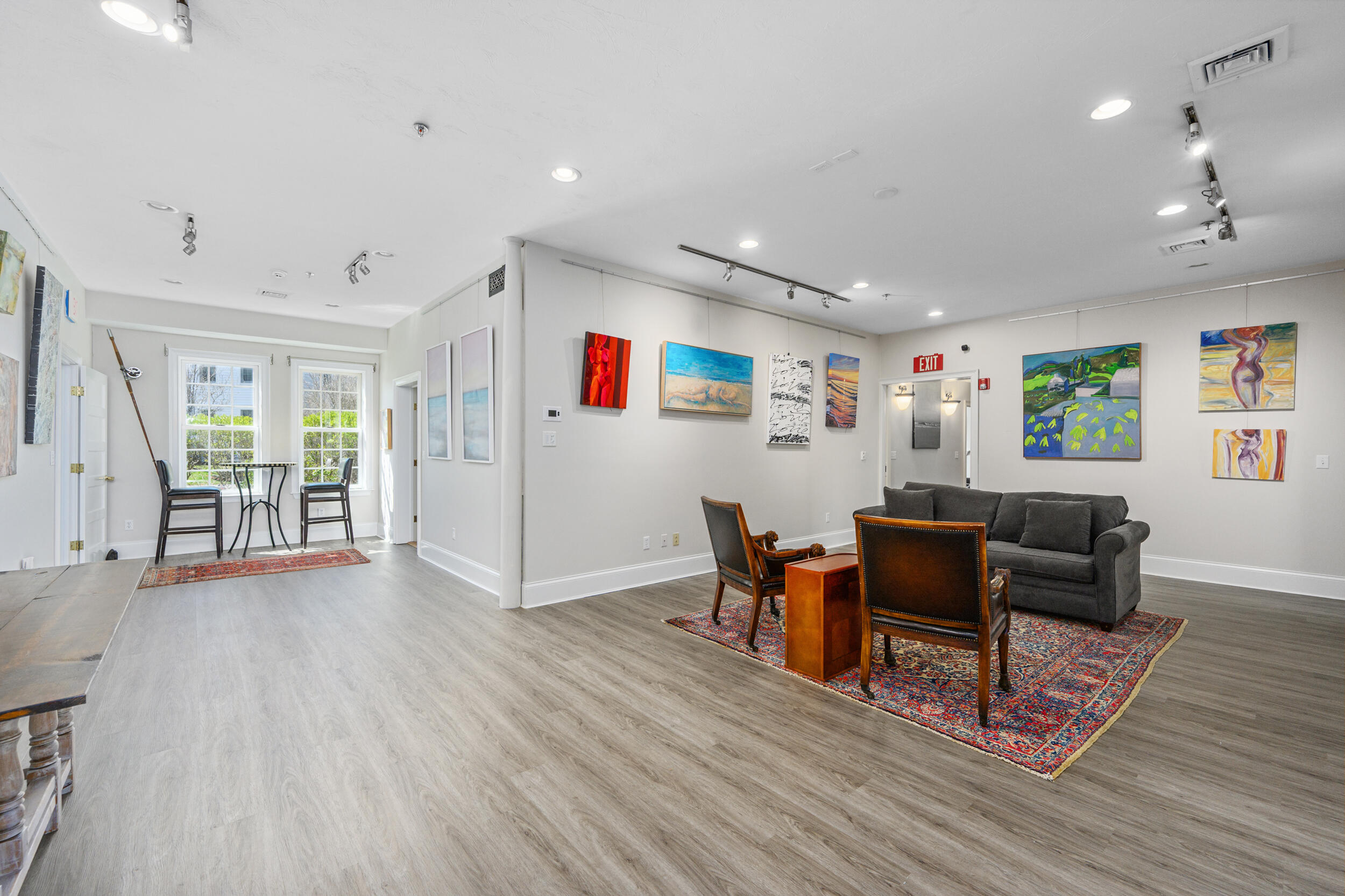143 Main Street Sandwich, MA 02563 - Photo 34 of 39 a living room with furniture and a wooden floor
