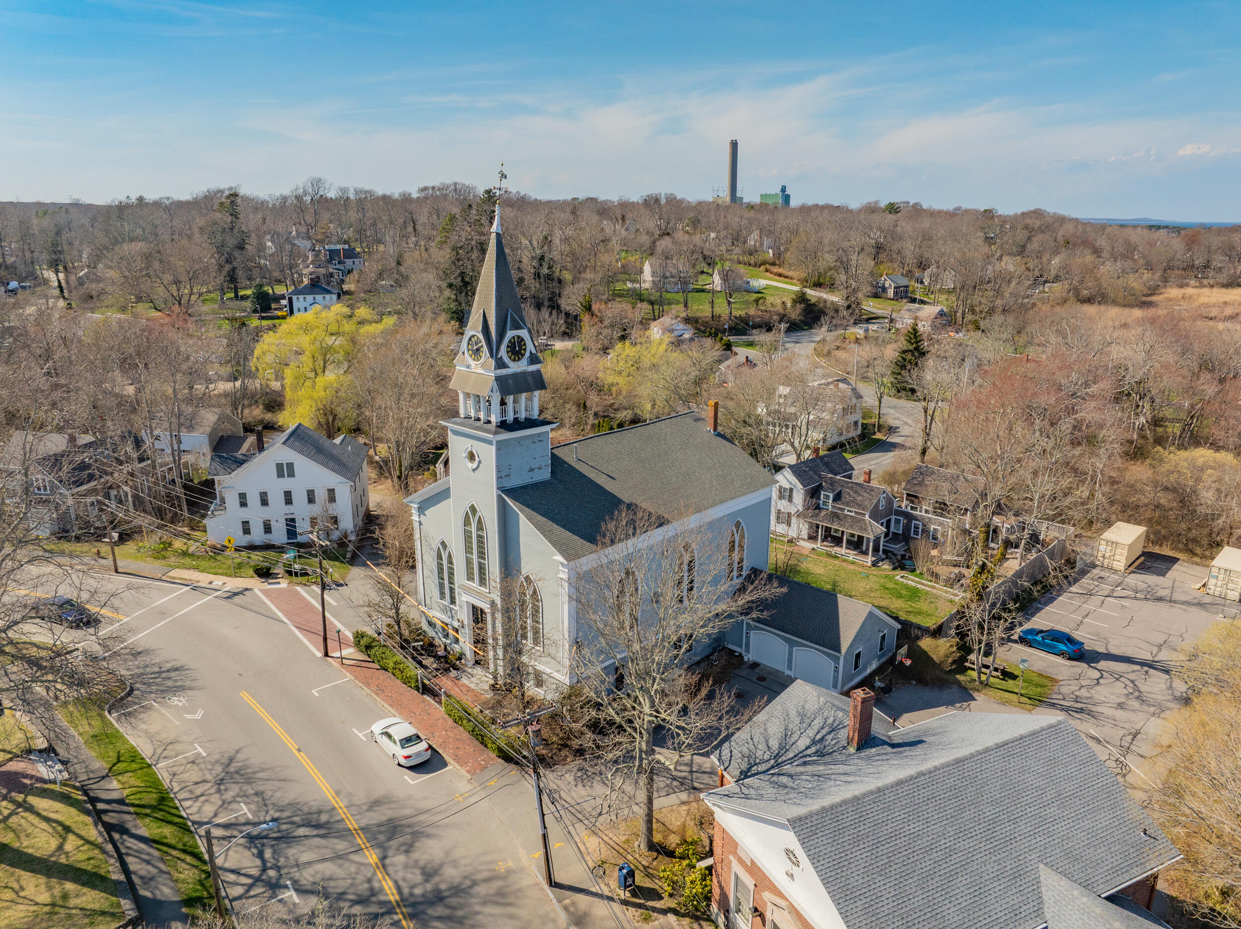 143 Main Street Sandwich, MA 02563 - Photo 6 of 39 a view of a city with tall buildings