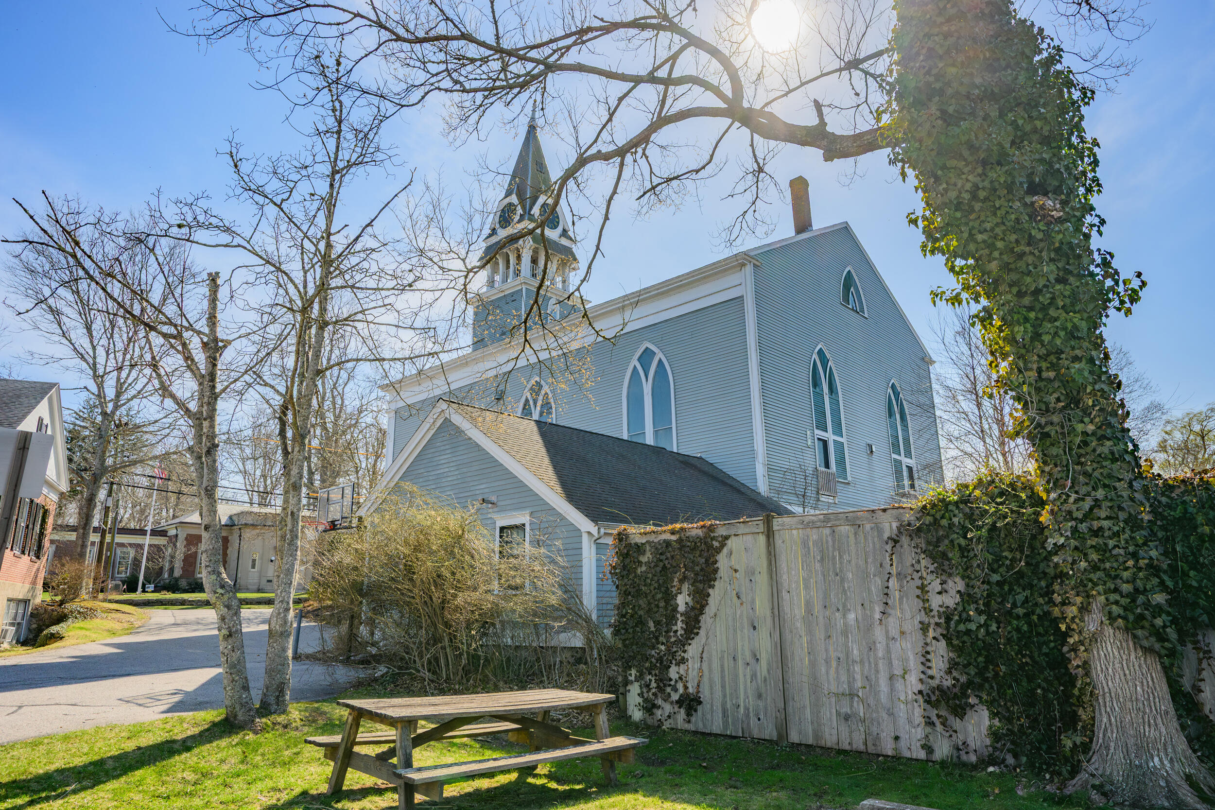 143 Main Street Sandwich, MA 02563 - Photo 9 of 39 a front view of a house with garden