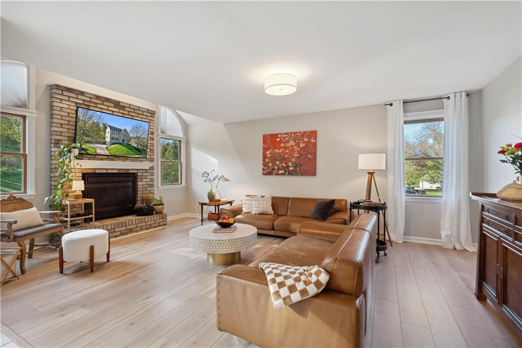 3018 White Pine Drive Gibsonia, PA 15044 - Photo 14 of 38 a living room with furniture and a fireplace