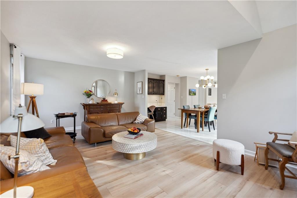 3018 White Pine Drive Gibsonia, PA 15044 - Photo 15 of 38 a living room with furniture a rug and a table