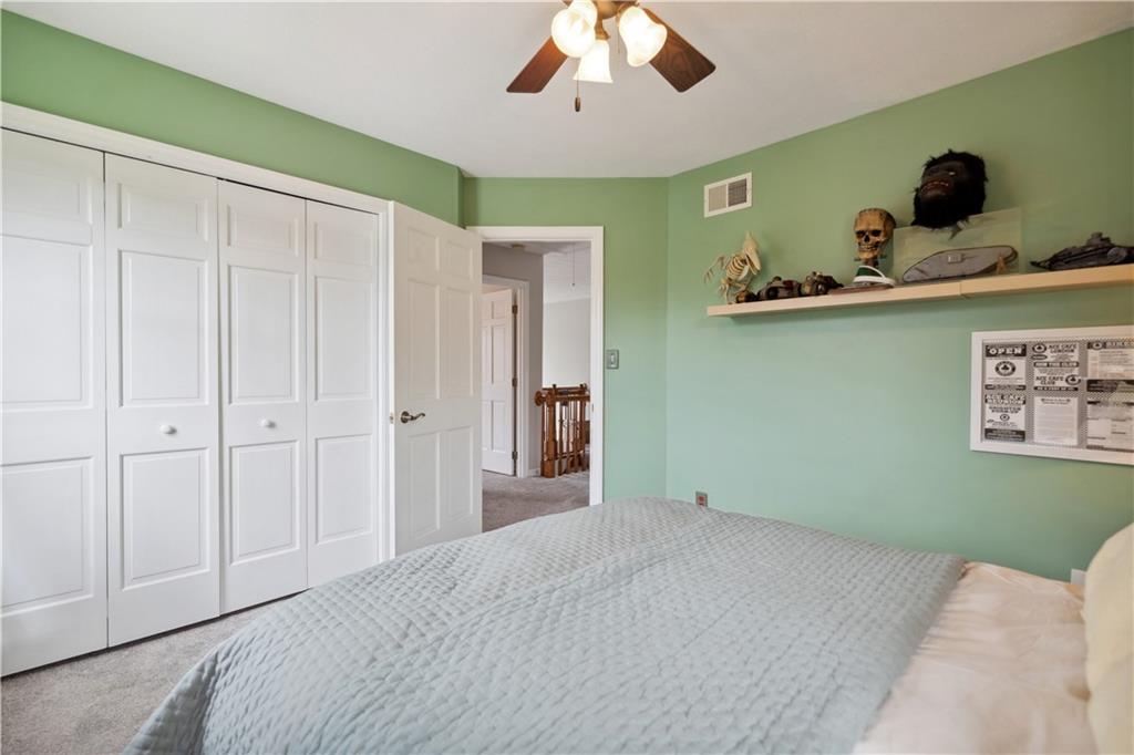 3018 White Pine Drive Gibsonia, PA 15044 - Photo 23 of 38 a bedroom with a bed and a window