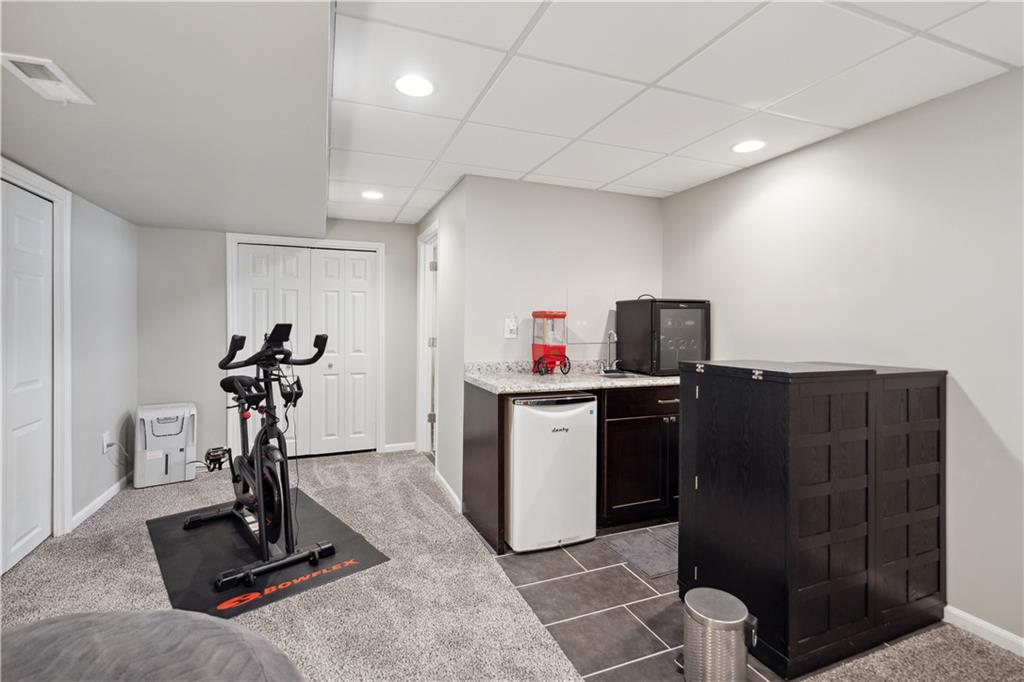 3018 White Pine Drive Gibsonia, PA 15044 - Photo 30 of 38 a view of a room with gym equipment