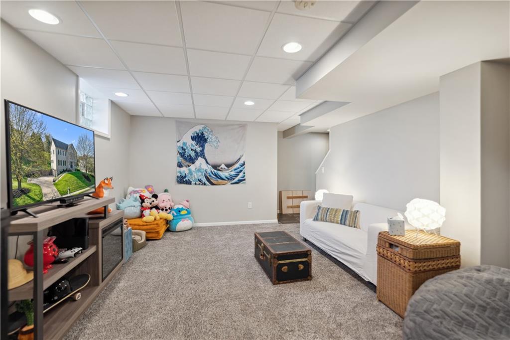 3018 White Pine Drive Gibsonia, PA 15044 - Photo 31 of 38 a bedroom with furniture and a flat screen tv