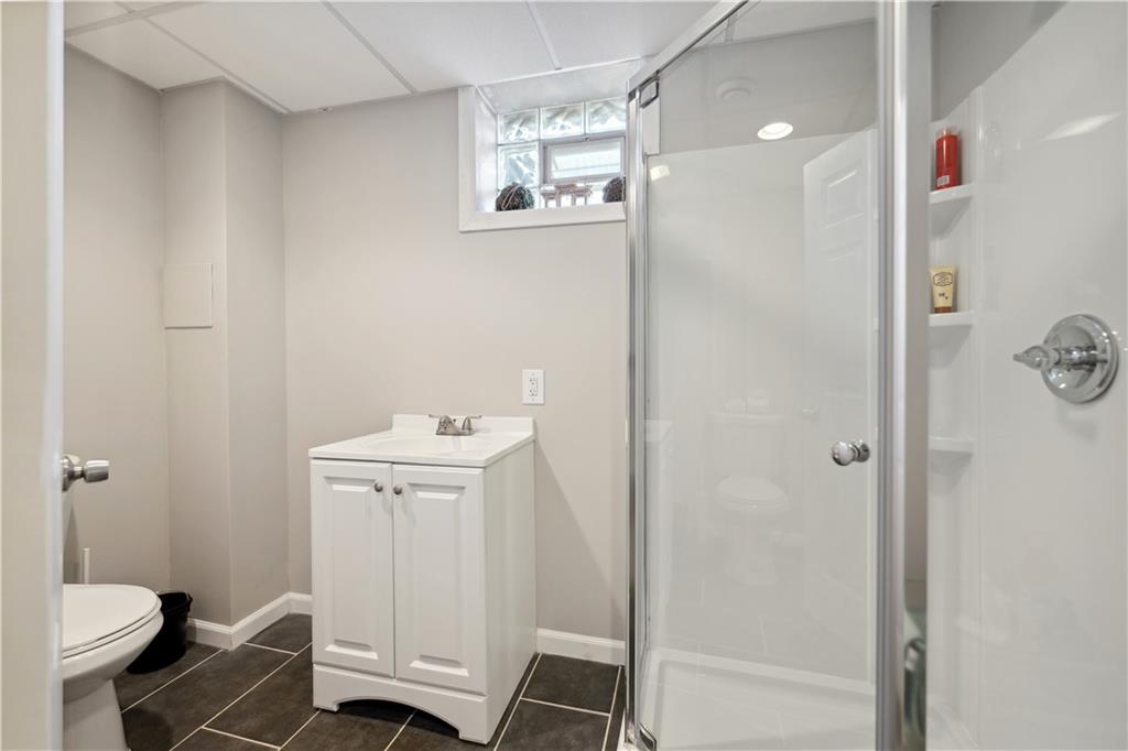 3018 White Pine Drive Gibsonia, PA 15044 - Photo 32 of 38 a bathroom with a sink a toilet and shower