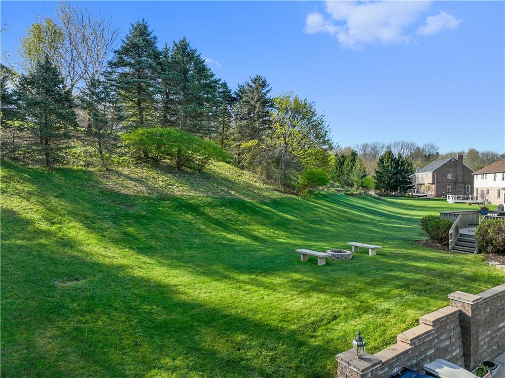 3018 White Pine Drive Gibsonia, PA 15044 - Photo 35 of 38 a view of a golf course with a lake