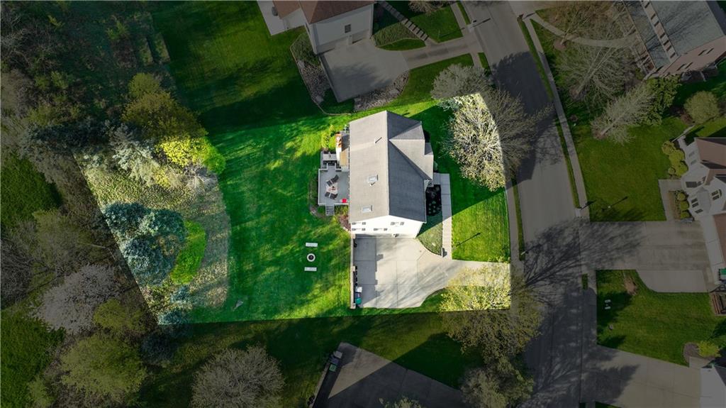 3018 White Pine Drive Gibsonia, PA 15044 - Photo 38 of 38 an aerial view of a house with a yard and tennis court